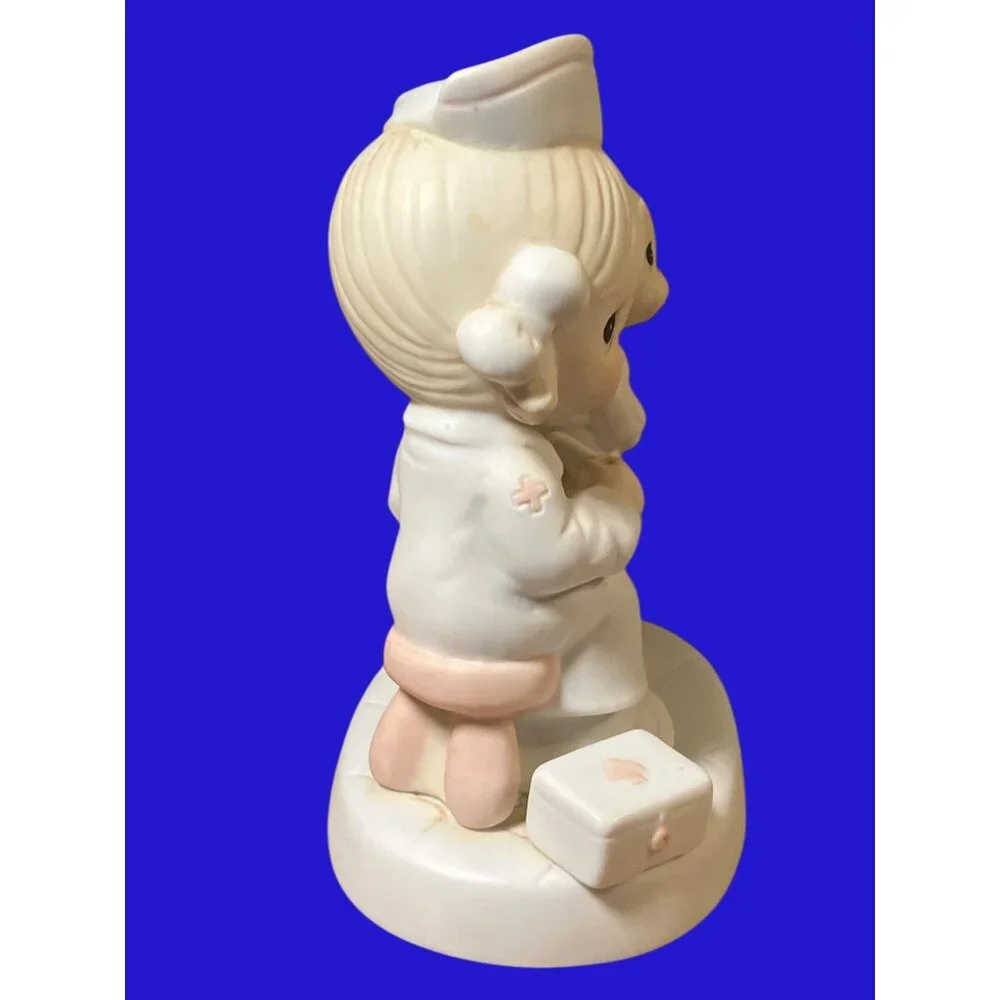 Precious Moments Love Beareth All Things Figurine E-7158 Nurse and Bear